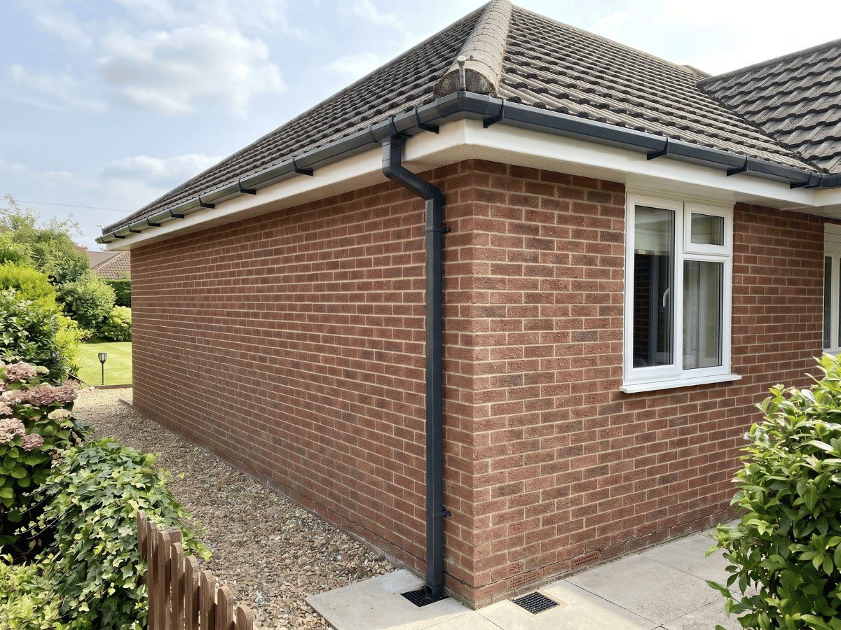 uPVC guttering and downpipe on a house